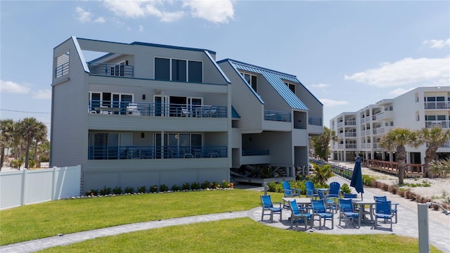 2400 N Beach Rd Unit 1, Englewood, FL 34223 - back of property featuring a patio area