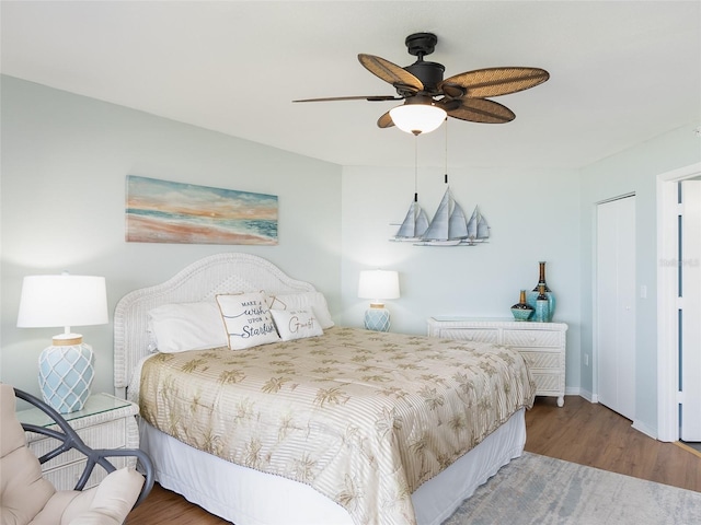2400 N Beach Rd Unit 1, Englewood, FL 34223 - bedroom with wood finished floors, baseboards, and ceiling fan