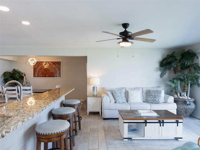 2400 N Beach Rd Unit 1, Englewood, FL 34223 - living room featuring recessed lighting, ceiling fan, and light wood-type flooring