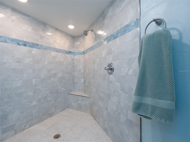 2400 N Beach Rd Unit 1, Englewood, FL 34223 - bathroom with a tile shower and recessed lighting