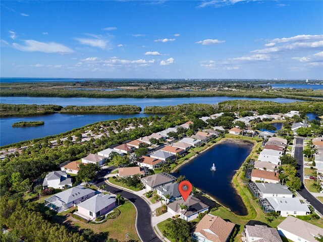 11367 Perico Isle Cir, Bradenton, FL 34209 - aerial view of property and surrounding area with nearby suburban area and a large body of water