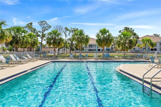 11367 Perico Isle Cir, Bradenton, FL 34209 - community pool with fence and a patio area