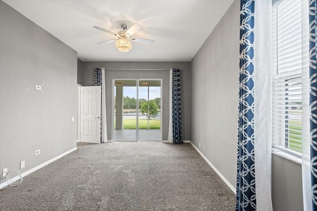 2808 124th Ave E, Parrish, FL 34219 - unfurnished room featuring a ceiling fan and carpet