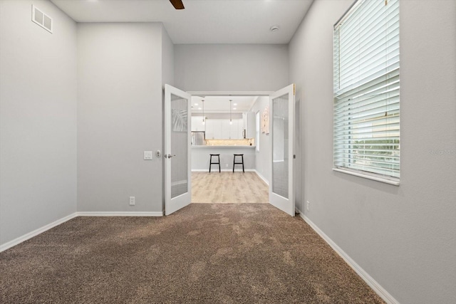 2808 124th Ave E, Parrish, FL 34219 - corridor with carpet flooring and baseboards