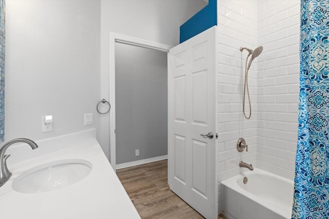 2808 124th Ave E, Parrish, FL 34219 - full bathroom with shower / bath combo with shower curtain and wood finished floors
