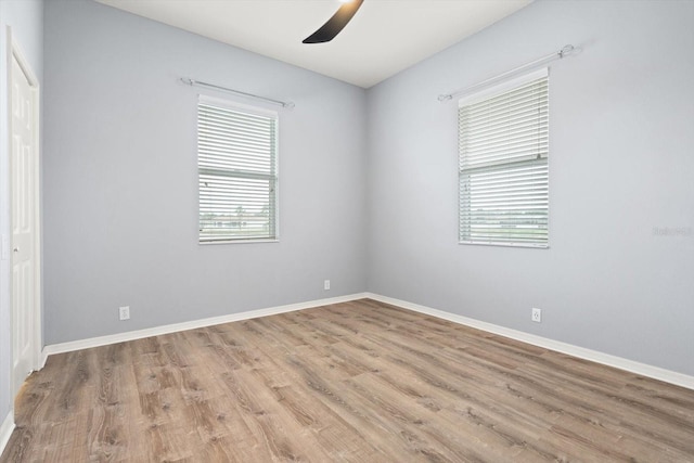 2808 124th Ave E, Parrish, FL 34219 - unfurnished room featuring light wood finished floors and a ceiling fan