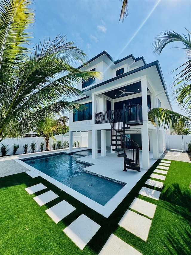 2809 Avenue Ave E, Holmes Beach, FL 34217 - back of house featuring stairs, a patio area, ceiling fan, and stucco siding