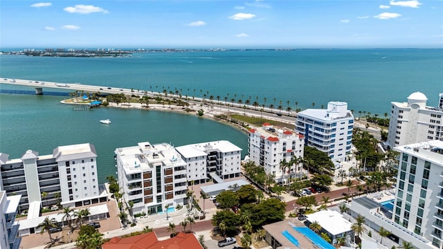 bird's eye view of apartment complex, a large body of water, and a notable bridge
