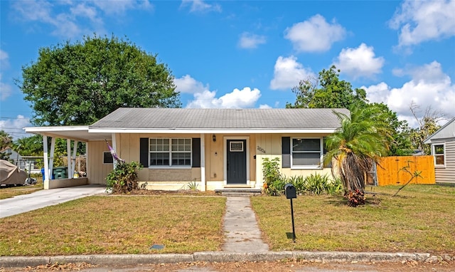 2004 19th St W, Bradenton, FL 34205 - view of front of home featuring concrete driveway and an attached carport