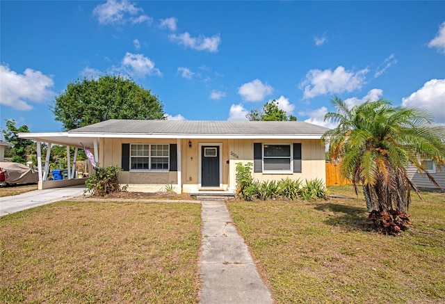 2004 19th St W, Bradenton, FL 34205 - view of front facade with concrete driveway and an attached carport