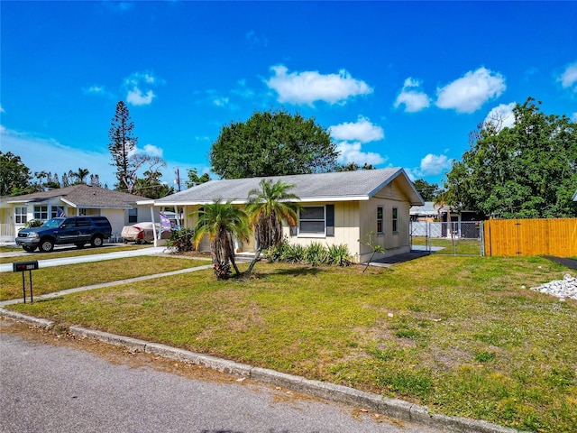 2004 19th St W, Bradenton, FL 34205 - ranch-style house featuring a gate and concrete driveway
