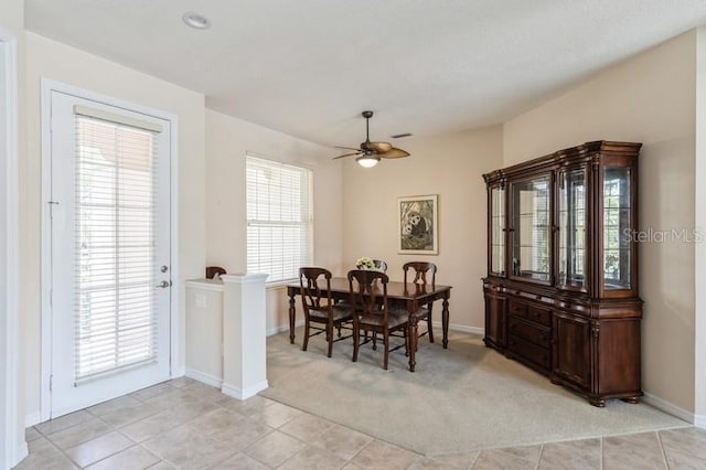 12007 Clubhouse Dr, Lakewood Ranch, FL 34202 - dining room with light colored carpet, a ceiling fan, and baseboards
