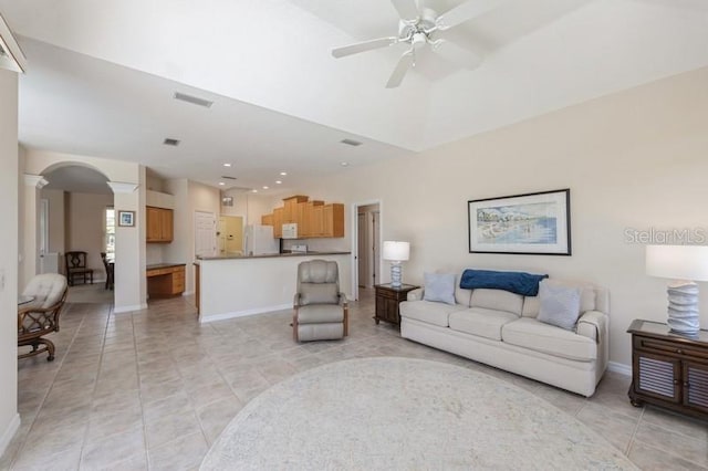 12007 Clubhouse Dr, Lakewood Ranch, FL 34202 - living room featuring ornate columns, ceiling fan, arched walkways, baseboards, and recessed lighting