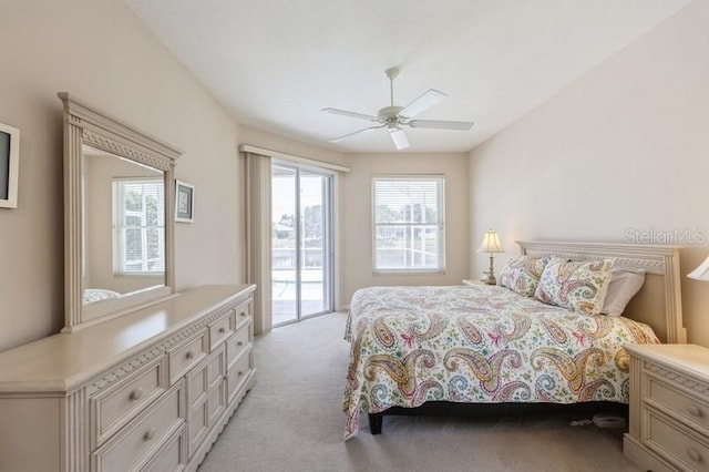 12007 Clubhouse Dr, Lakewood Ranch, FL 34202 - bedroom with access to outside, light colored carpet, and ceiling fan