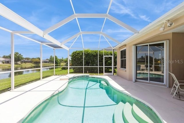 12007 Clubhouse Dr, Lakewood Ranch, FL 34202 - outdoor pool featuring a water view, a patio area, and a lanai