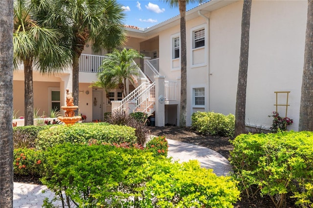 view of property with stairway
