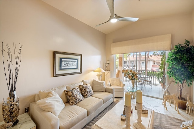 living area featuring ceiling fan, tile patterned flooring, and high vaulted ceiling