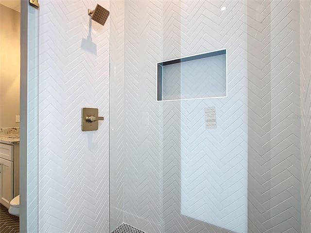 7152 Bougainvillea St, Englewood, FL 34224 - bathroom view of tiled shower, vanity, and toilet