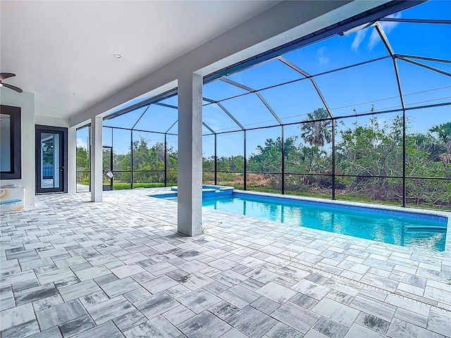 7152 Bougainvillea St, Englewood, FL 34224 - view of pool with a patio, a pool with connected hot tub, a lanai, and a ceiling fan
