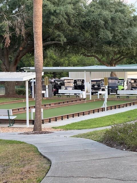 view of home's community featuring a bocce ball area