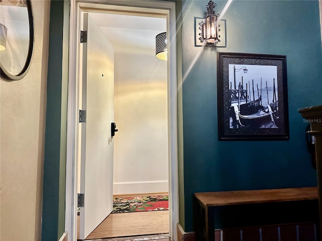 210 N 17th St W Unit 15, Bradenton, FL 34205 - hallway featuring wood finished floors