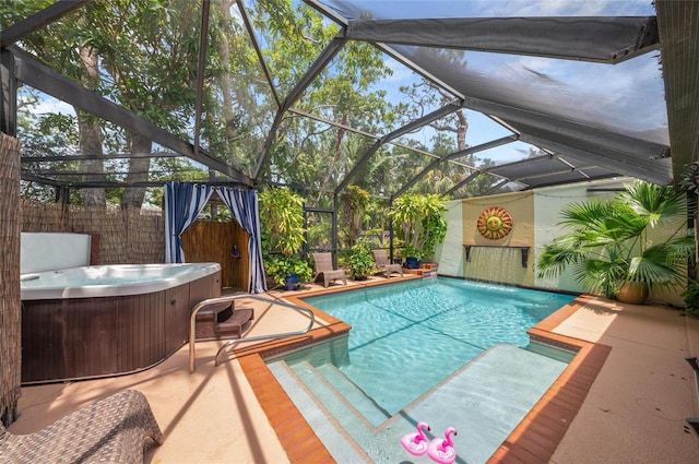 941 Virginia Dr, Sarasota, FL 34234 - view of pool with a hot tub, a patio area, glass enclosure, and fence