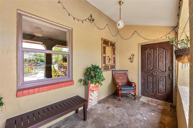 941 Virginia Dr, Sarasota, FL 34234 - property entrance with covered porch and stucco siding