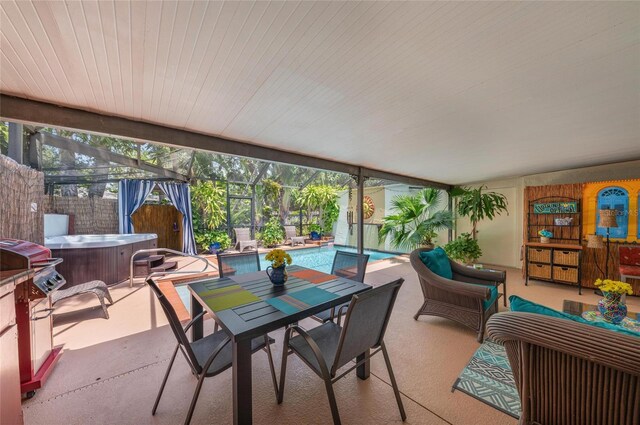 941 Virginia Dr, Sarasota, FL 34234 - sunroom / solarium featuring a jacuzzi and healthy amount of natural light