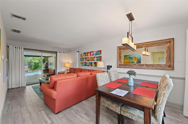 941 Virginia Dr, Sarasota, FL 34234 - living room featuring wood finished floors