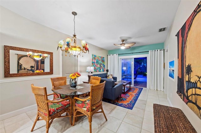 941 Virginia Dr, Sarasota, FL 34234 - dining room featuring a chandelier, light tile patterned floors, baseboards, and a ceiling fan