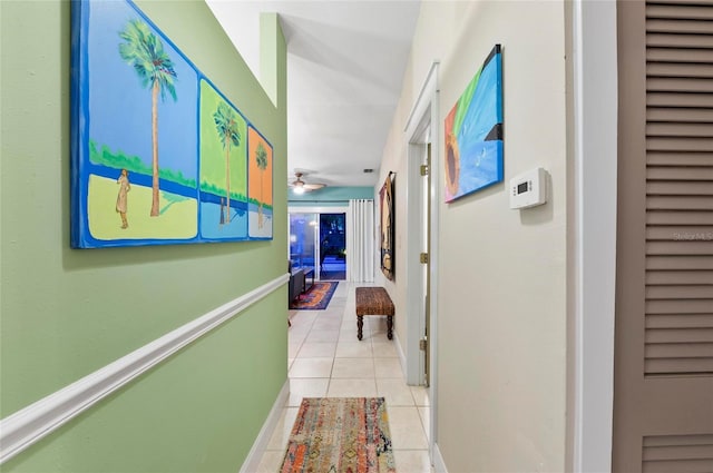 941 Virginia Dr, Sarasota, FL 34234 - corridor featuring light tile patterned floors and baseboards