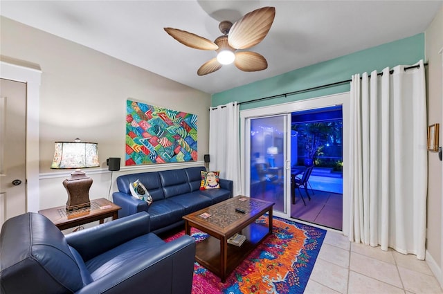 941 Virginia Dr, Sarasota, FL 34234 - living area with ceiling fan and light tile patterned floors