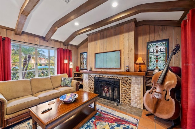 941 Virginia Dr, Sarasota, FL 34234 - living area featuring wood walls, a tile fireplace, and tile patterned floors