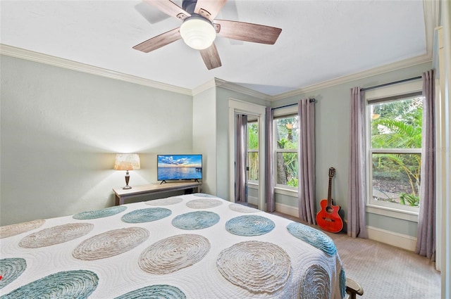 941 Virginia Dr, Sarasota, FL 34234 - carpeted bedroom featuring ornamental molding, a ceiling fan, and baseboards