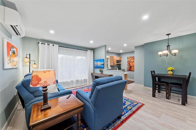 941 Virginia Dr, Sarasota, FL 34234 - living room with an AC wall unit, a chandelier, baseboards, recessed lighting, and light wood-style floors