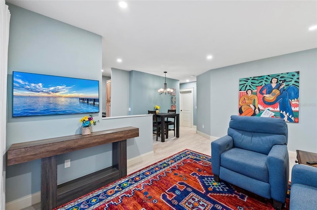 941 Virginia Dr, Sarasota, FL 34234 - living area with recessed lighting, a chandelier, and baseboards