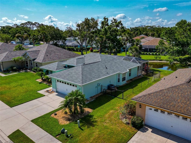 aerial view of residential area with a nearby body of water