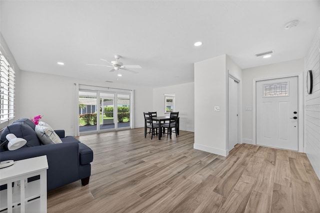 2733 Riverbluff Pl Unit V57, Sarasota, FL 34231 - living area featuring light wood-type flooring, ceiling fan, and recessed lighting