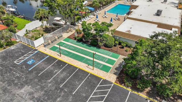 2733 Riverbluff Pl Unit V57, Sarasota, FL 34231 - drone / aerial view of a pool and a large body of water