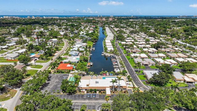 2733 Riverbluff Pl Unit V57, Sarasota, FL 34231 - aerial perspective of suburban area featuring a large body of water