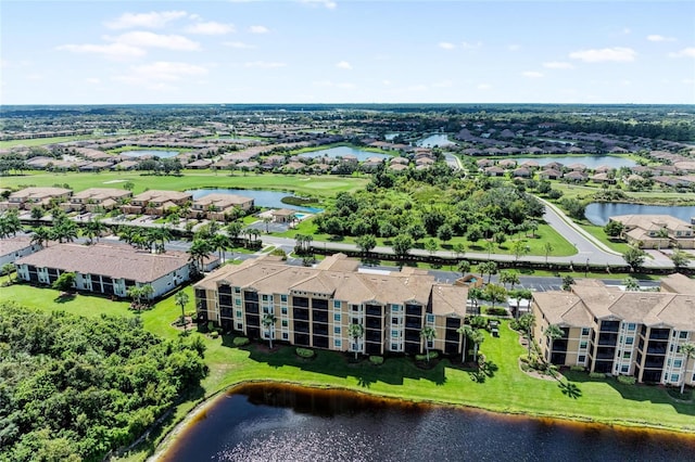 6519 Grand Estuary Trl Unit 107, Bradenton, FL 34212 - aerial view of a nearby body of water, a golf course, and apartment complex / building