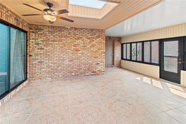 911 Cimarron Cir, Bradenton, FL 34209 - unfurnished sunroom with a skylight