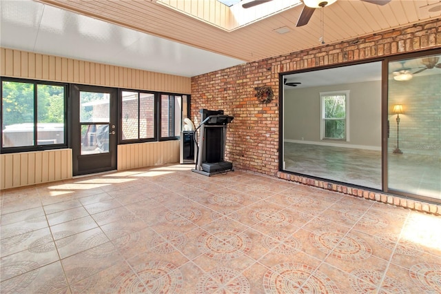 911 Cimarron Cir, Bradenton, FL 34209 - unfurnished sunroom featuring a skylight and radiator