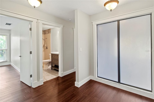911 Cimarron Cir, Bradenton, FL 34209 - empty room with dark wood-type flooring and baseboards
