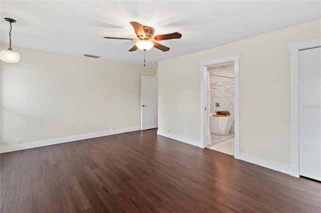 911 Cimarron Cir, Bradenton, FL 34209 - unfurnished bedroom featuring dark wood-type flooring