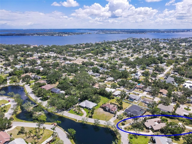 911 Cimarron Cir, Bradenton, FL 34209 - aerial perspective of suburban area with a large body of water and property parcel outlined