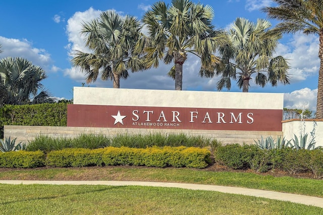 view of community sign