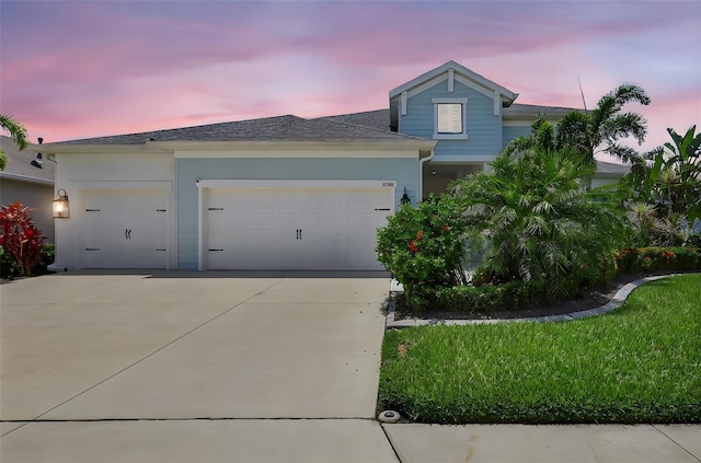 13918 Old Creek Ct, Parrish, FL 34219 - view of front of property featuring an attached garage and concrete driveway