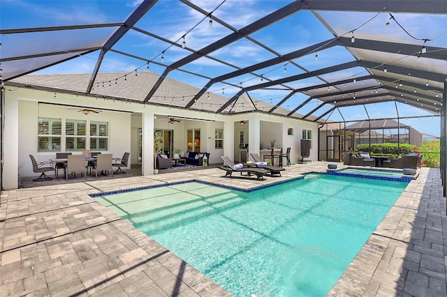 13918 Old Creek Ct, Parrish, FL 34219 - view of pool featuring ceiling fan, a patio, an outdoor living space, outdoor dining space, and a pool with connected hot tub