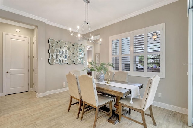 13918 Old Creek Ct, Parrish, FL 34219 - dining space with a chandelier, baseboards, light wood-style floors, and ornamental molding